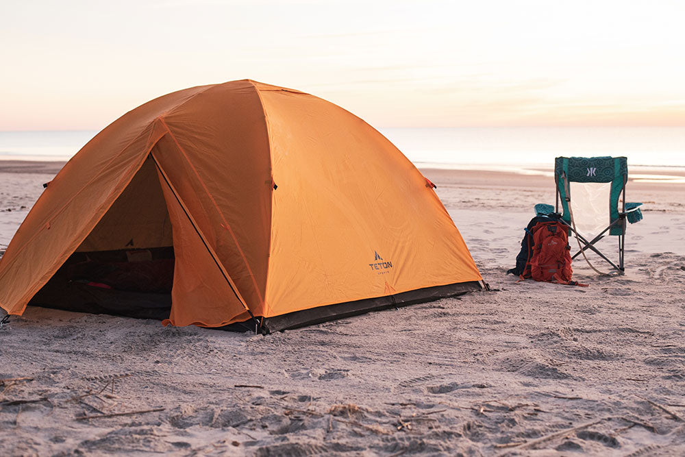 Mountain Ultra tent and Oasis packs on the beach