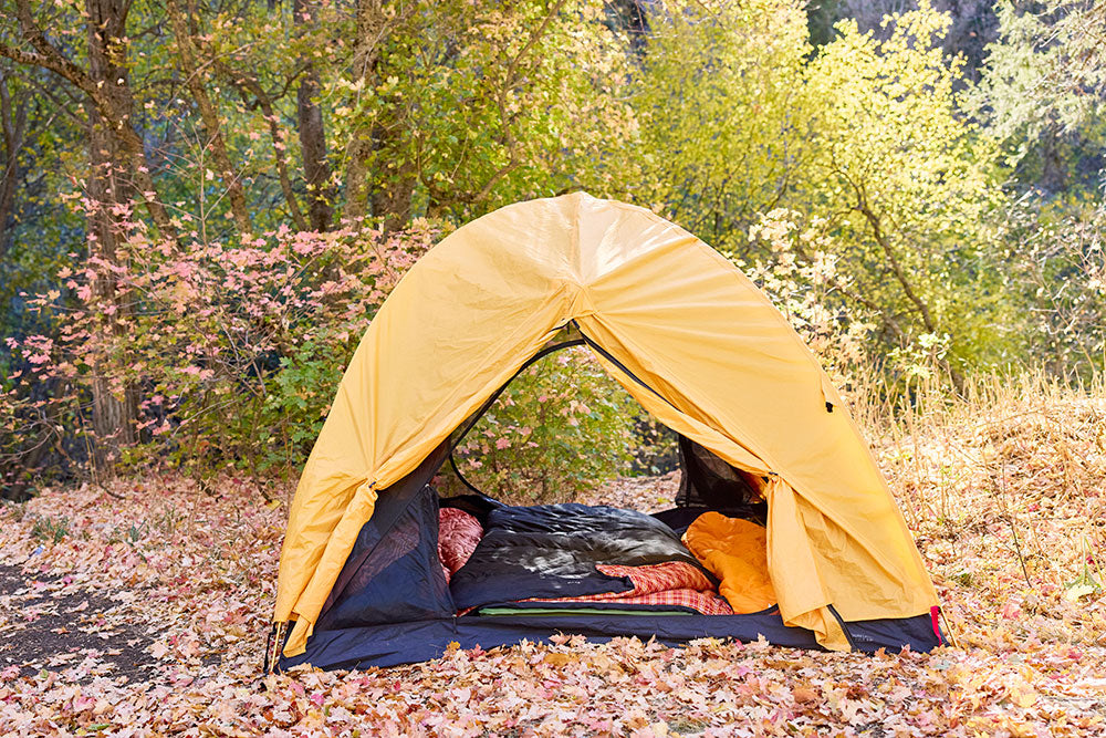 Mountain Ultra tent and campsite set up in fall scenery.