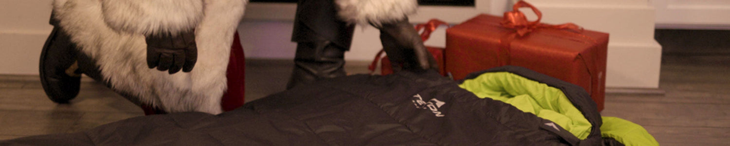 Santa putting down a Leef sleeping bag