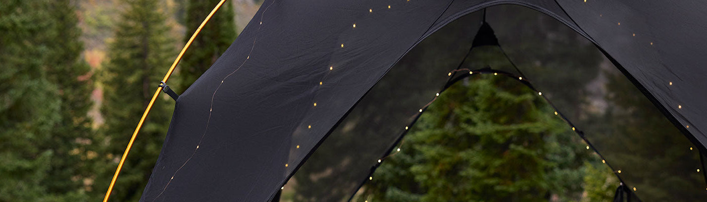 A TETON Sports Mountain Ultra tent decorated with holiday lights