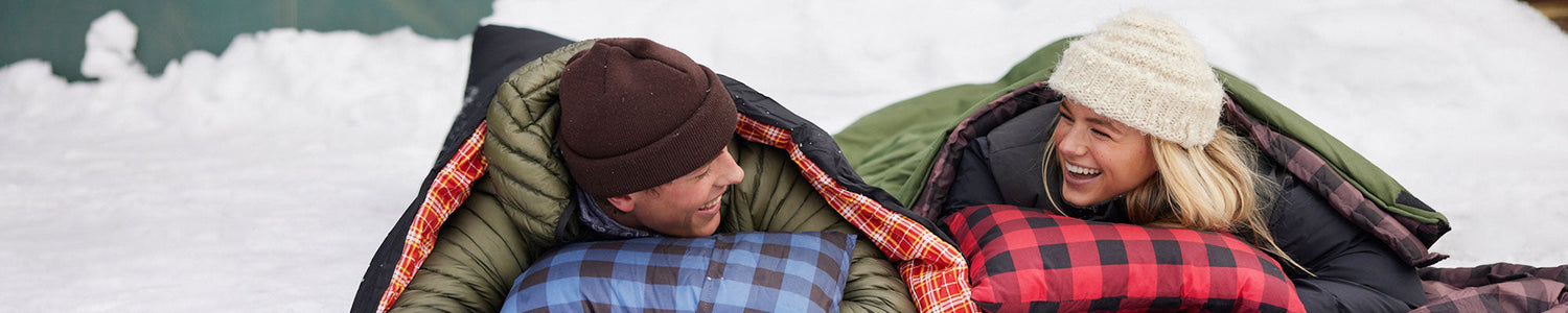 Friends with their camp pillows for winter camping