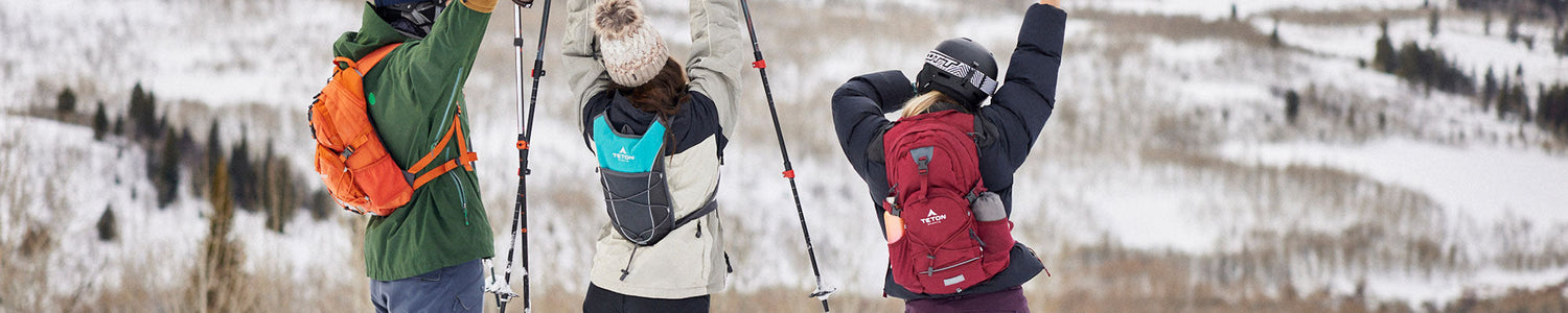 Three friends with Teton hydration packs