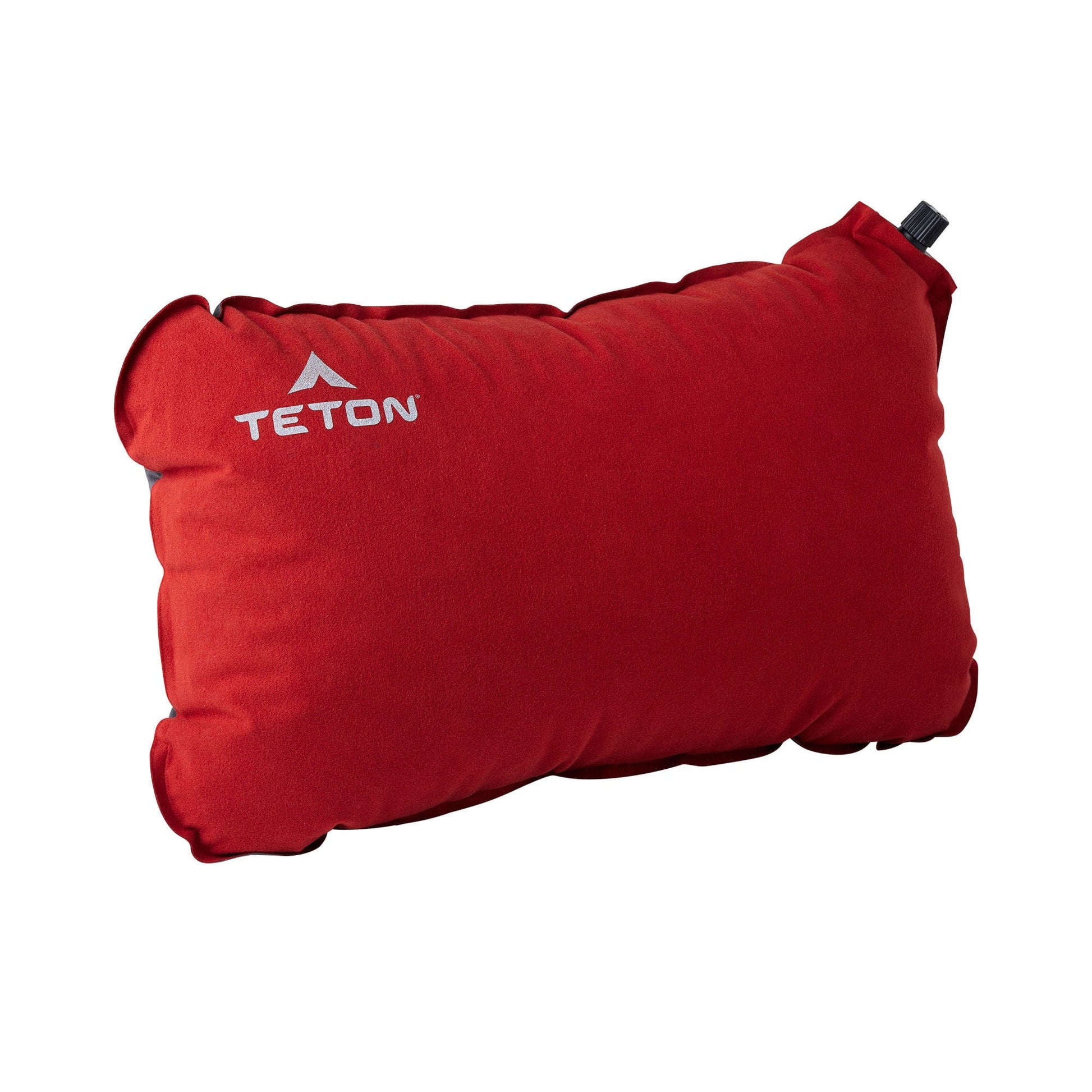 Red inflatable pillow with TETON logo on a white background