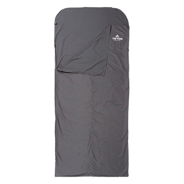 Gray sleeping bag liner with Teton brand logo on a white background