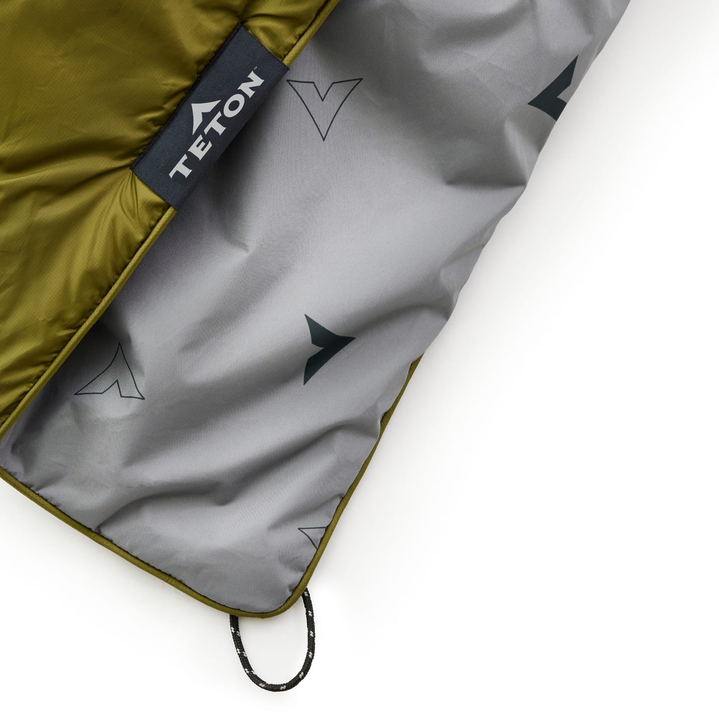Green ripstop fabric with a drawstring on a white background