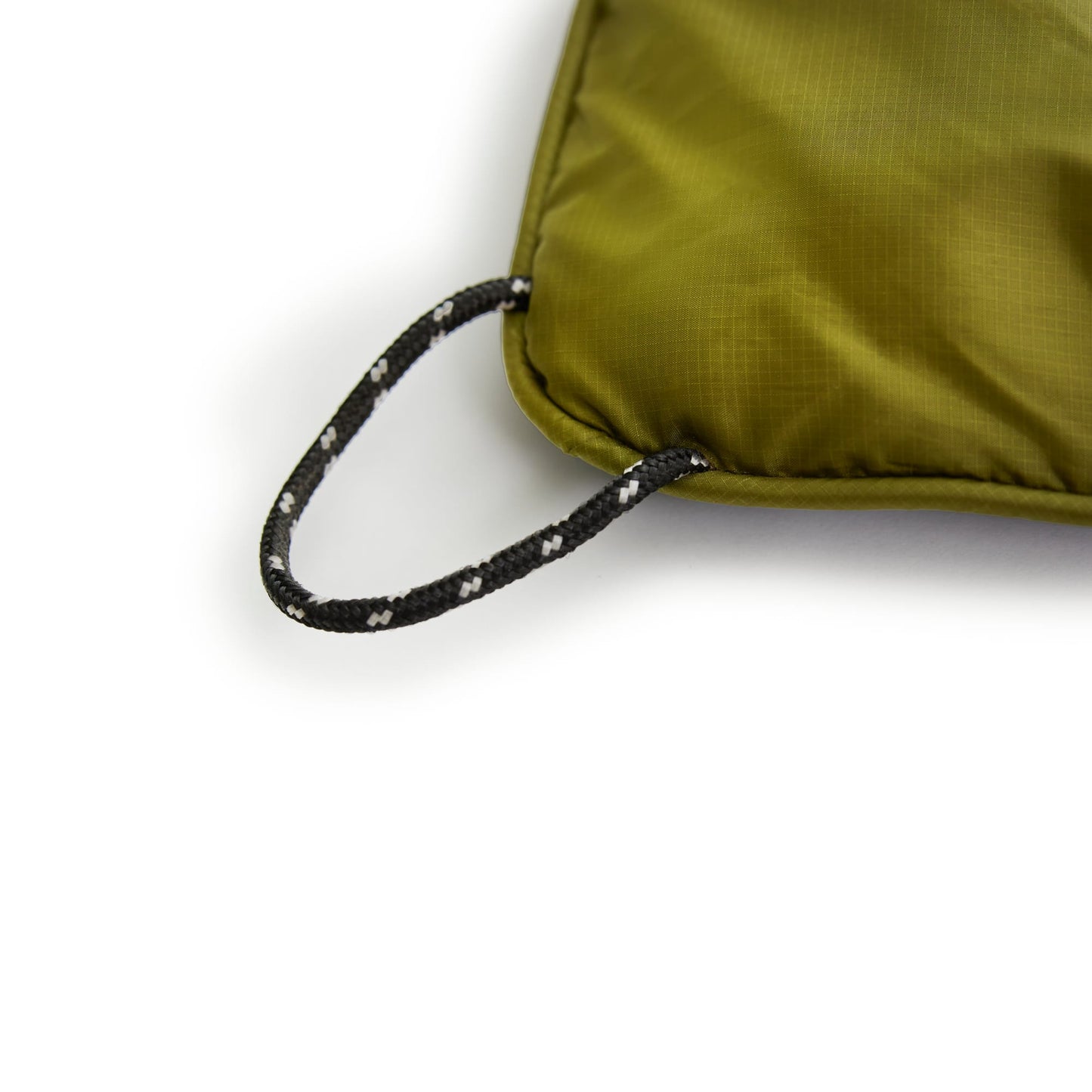 Green ripstop fabric with a drawstring on a white background