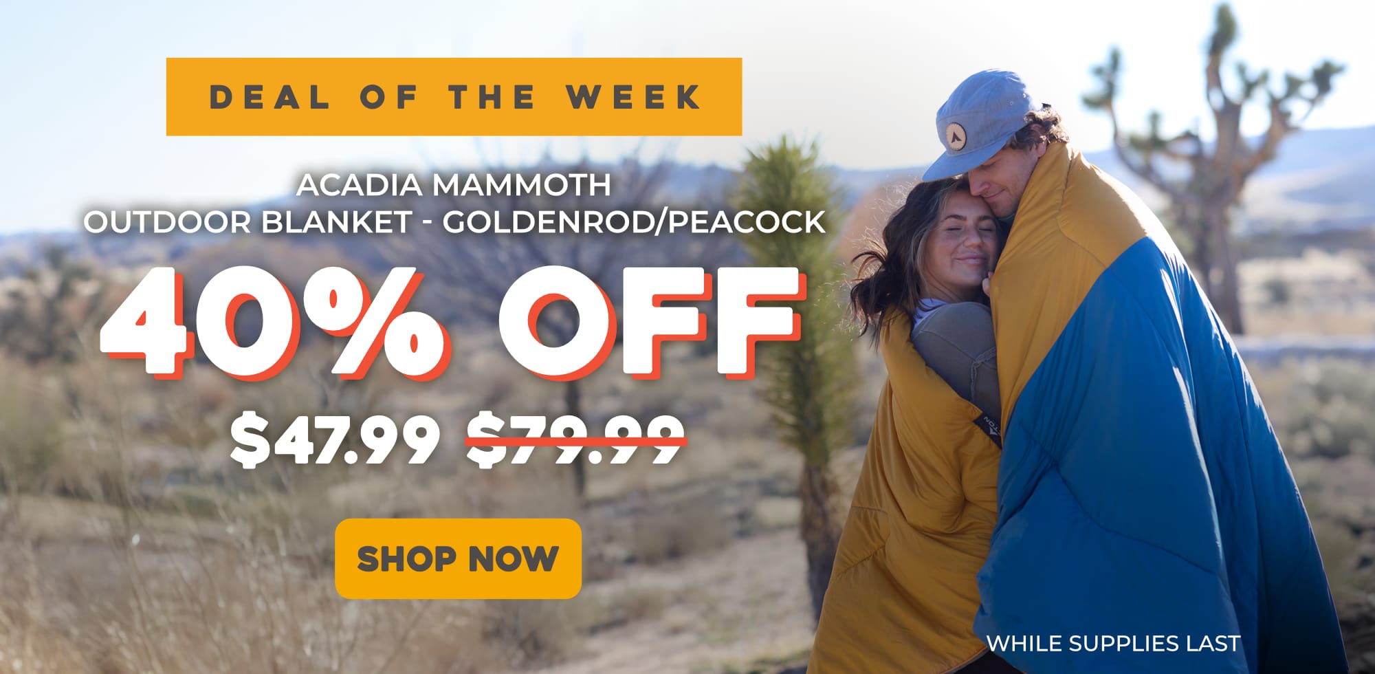 Two people wrapped in the acadia mammoth blanket with promotional text "40% OFF Acadia Mammoth in Golden/Peacock Final Price is $47.99"