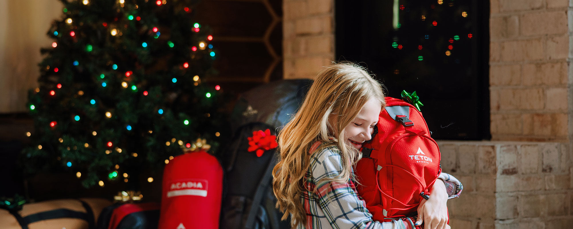 A girl in a holiday scene with her Oasis pack