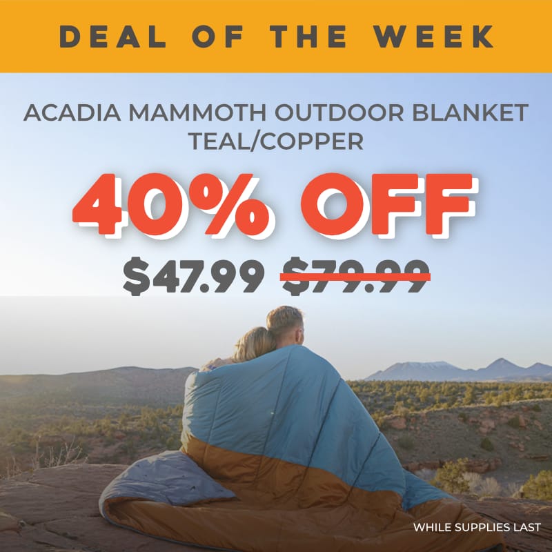Promotional outdoor ad showing a couple wrapped in an outdoor blanket on a desert landscape, with large text reading 'DEAL OF THE WEEK', '40% OFF', '$47.99